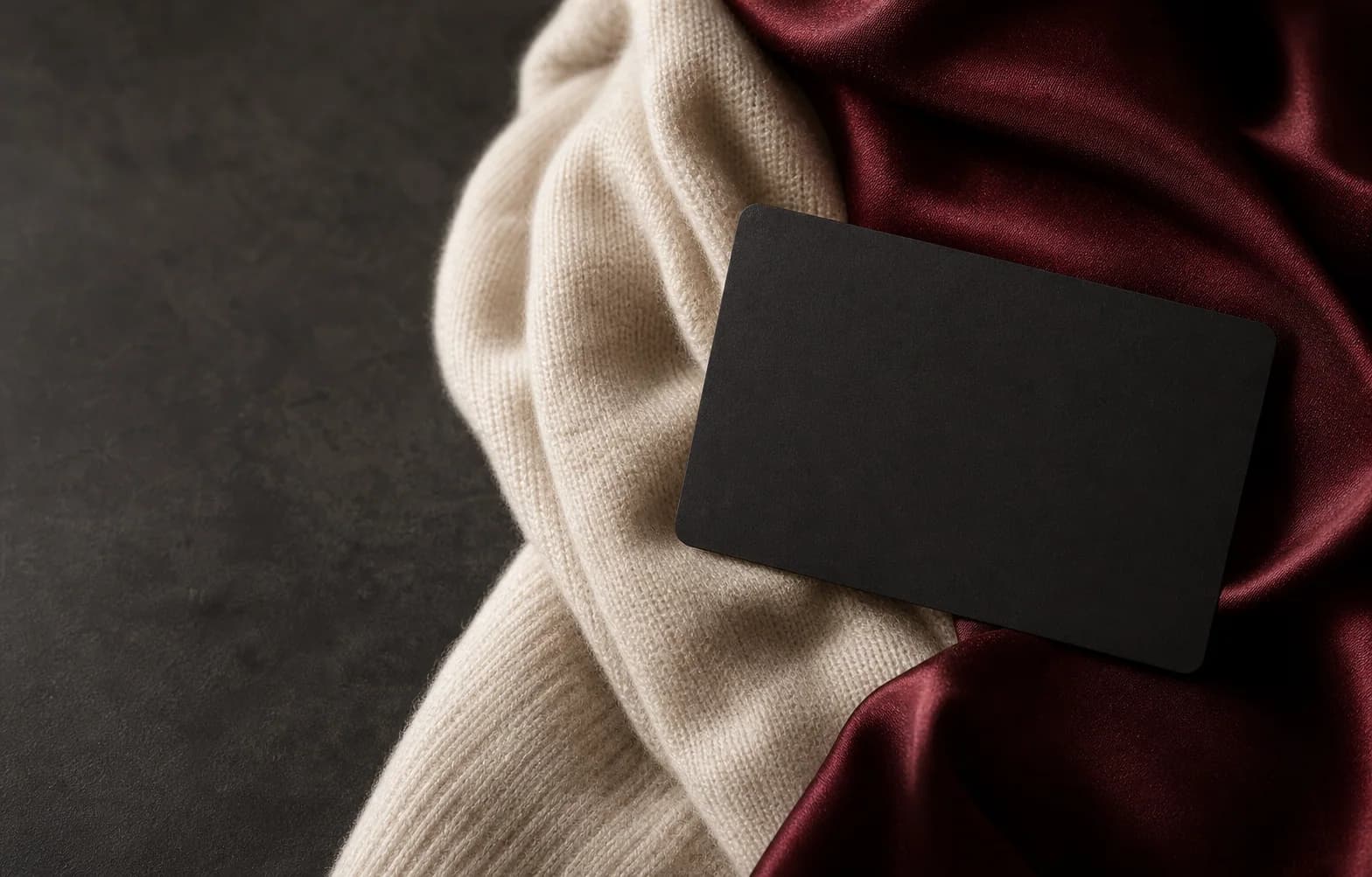 Stefanel gift card with cashmere and burgundy satin